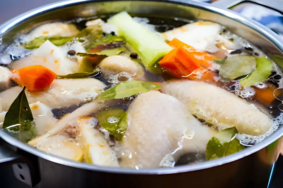 Discover the authentic Chicken Souse Recipe, a Bahamian culinary treasure. Perfect for any meal, learn to make this savory delight today!